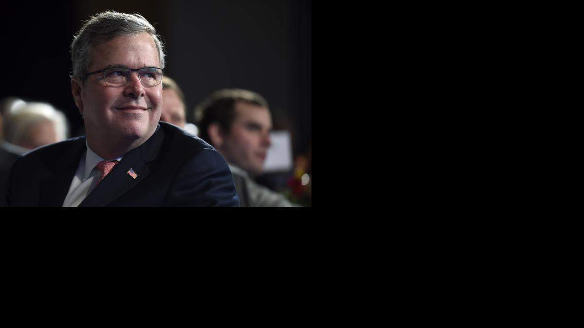 
Former Florida Gov. Jeb Bush listens to a speaker before giving his keynote address at the National Summit on Education Reform in Washington, Thursday, Nov. 20, 2014. He is widely seen by conservative activists as too moderate to be considered the 2016 presidential nominee, but Florida politicians say Bush was a true conservative as the state’s governor.
