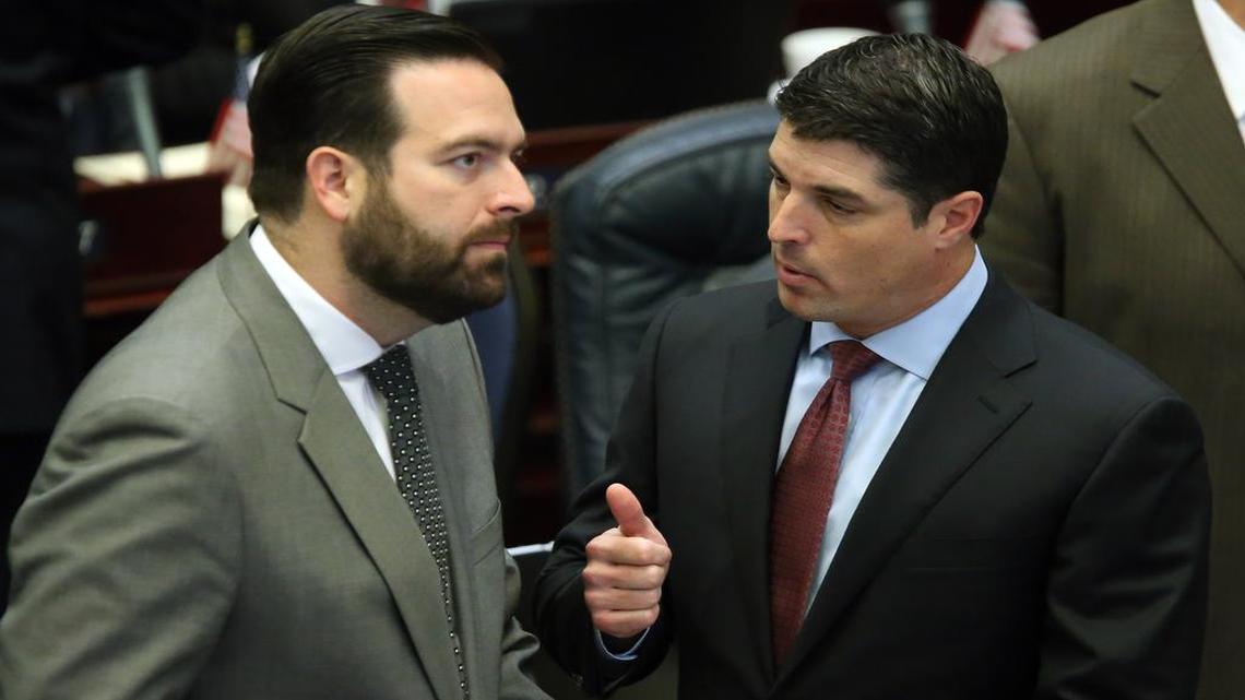 
House speaker Steve Crisafulli, R-Merritt Island, left, confers with Rep. Jose Diaz, R-Miami, during a legislative session, Tuesday, April 28, 2015, in Tallahassee, Fla. 
