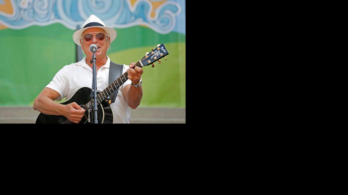 
Jimmy Buffett sings on the steps of the old Capitol building in downtown Tallahassee on Tuesday, April 7, 2015. The performance was part of the Everglades Action Day rally at the Capitol, sponsored by the Everglades Coalition.
