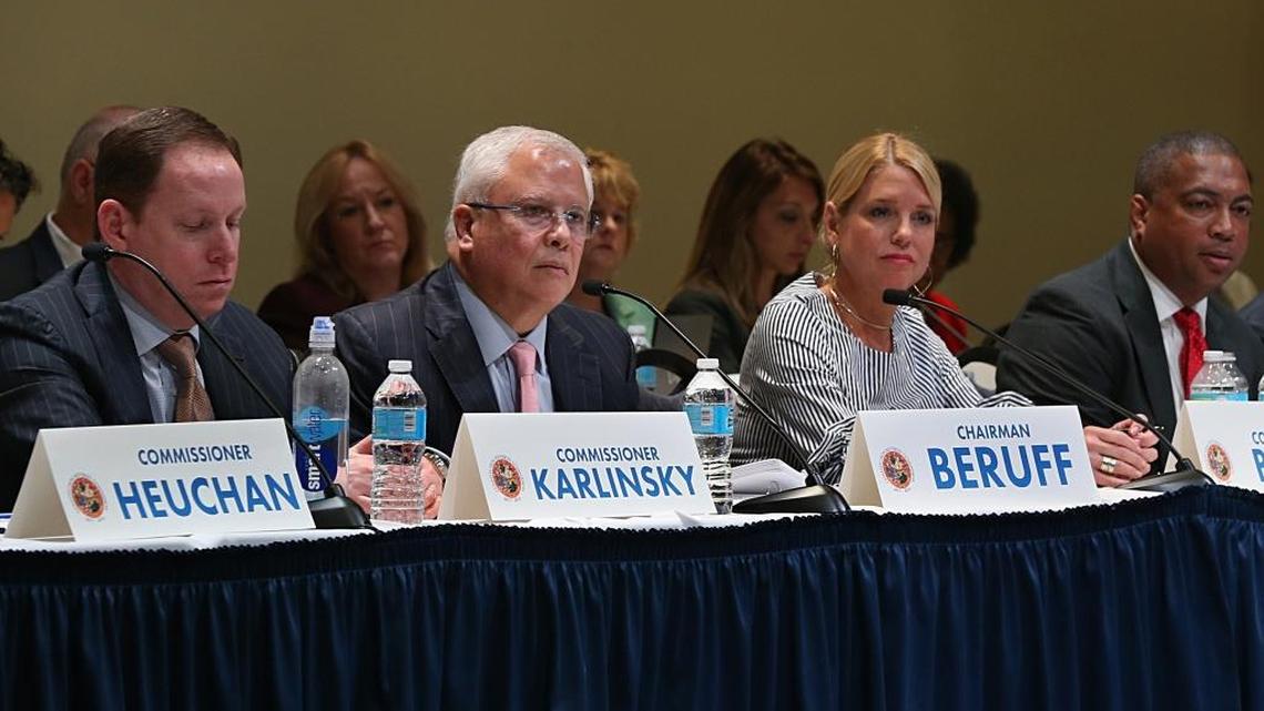 Chairman Carlos Beruff, center, is flanked by Commissioner Fred Karlinsky and Attorney General Pam Bondi as members of the Constitutional Revision Commission listen to residents during a town hall meeting at Florida International University in Miami, April 6, 2017. The commission will give the public until Oct. 6 to submit suggestions.