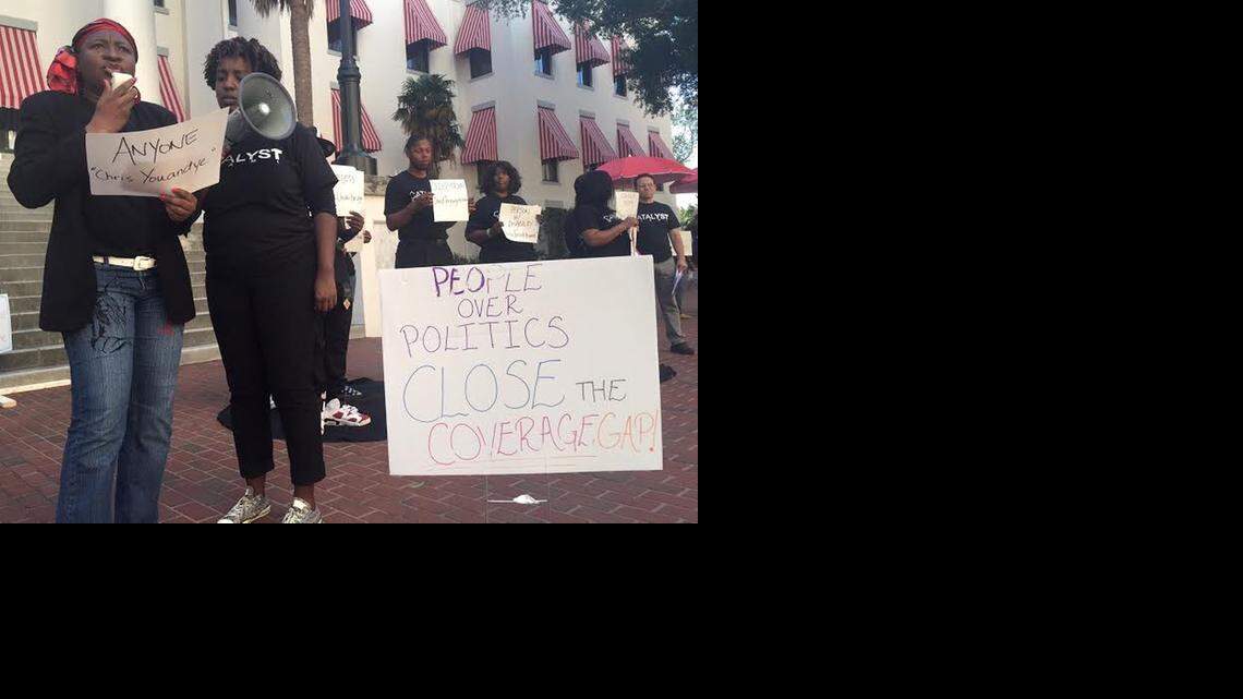 
Yanick Landess, of Miami, leads a demonstration in support of Medicaid expansion at the Florida Capitol on April 9.
