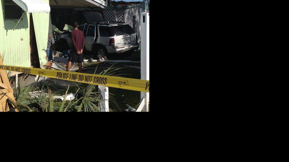 
An SUV crash into a Palmetto mobile home kills sleeping couple and unborn child.
