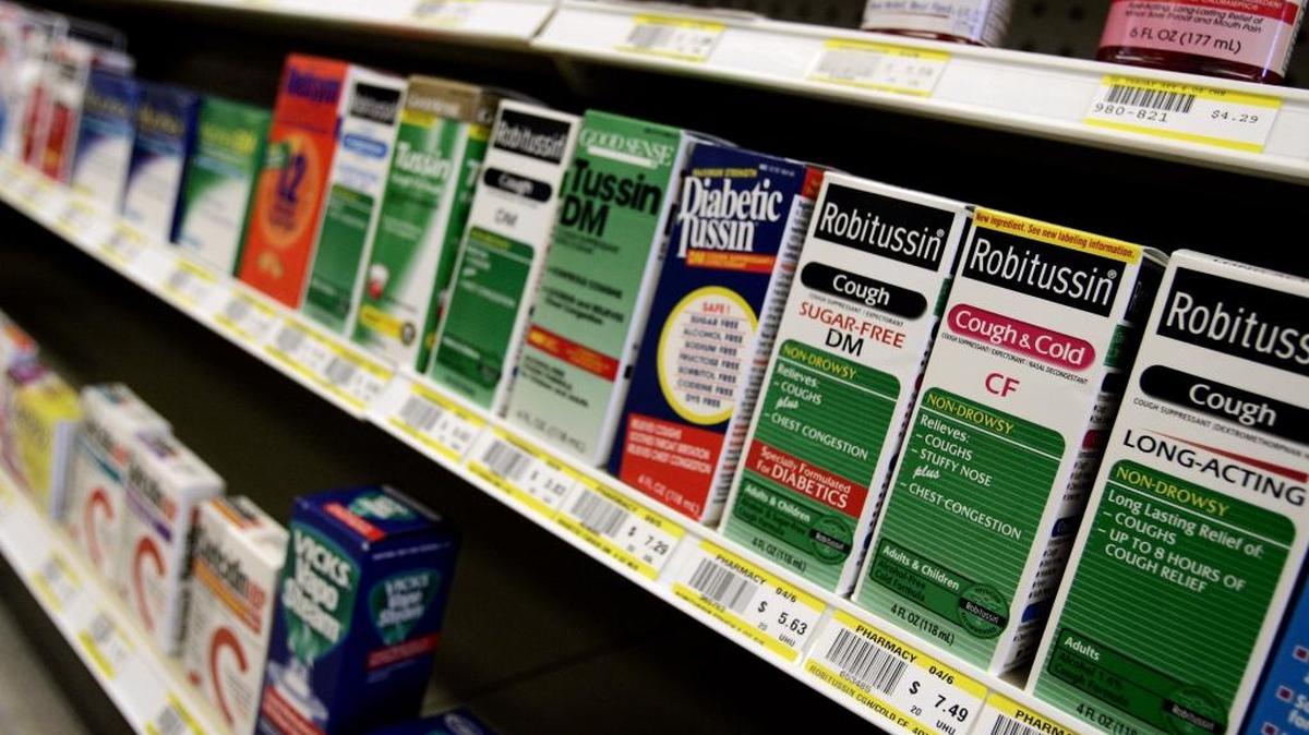 Cough syrup containing a non-regulated ingredient, dextromethorphan, is on display on a store shelf at an Edmond, Okla., pharmacy as seen Thursday, May 18, 2006.