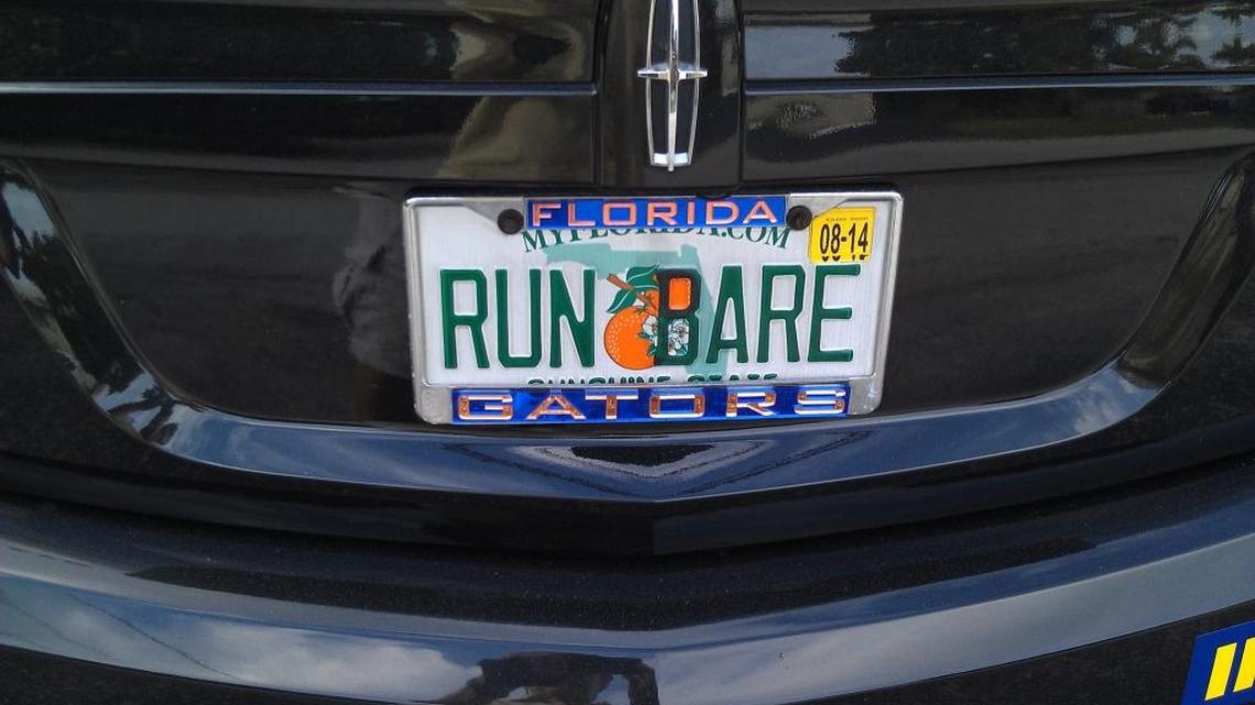 License plate frames such as this one are illegal to have on your plates under Florida law.