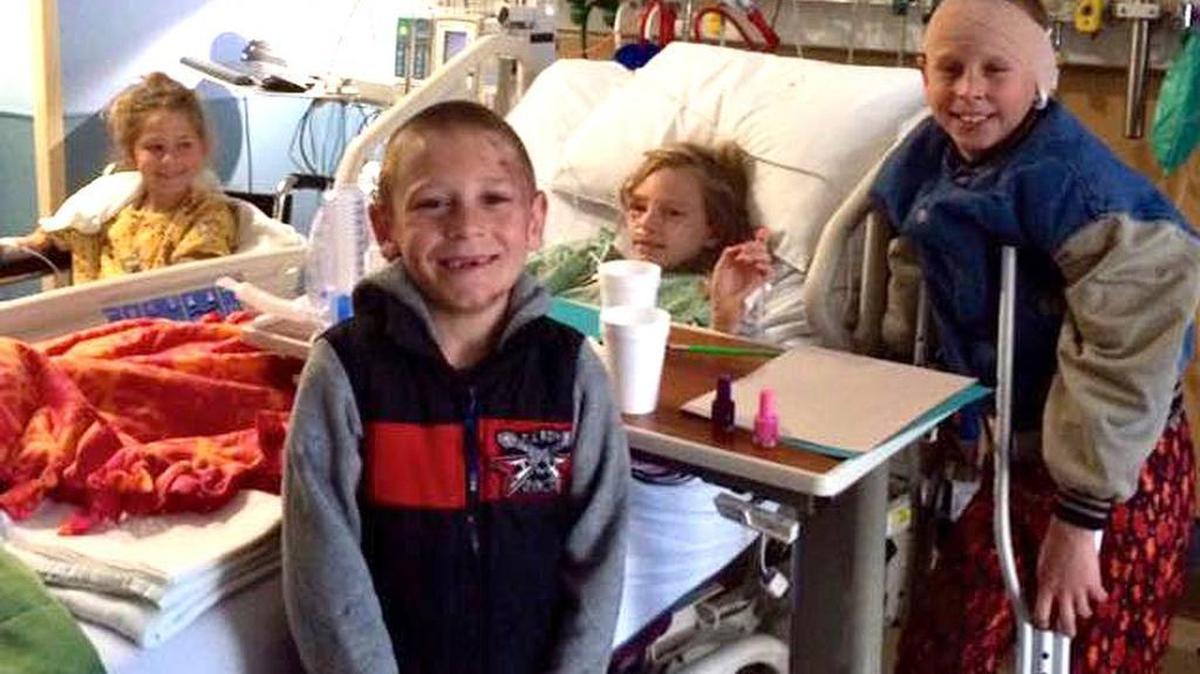 Children injured in a tornado that touched down early Sunday in Duette, spend time together in a hospital.