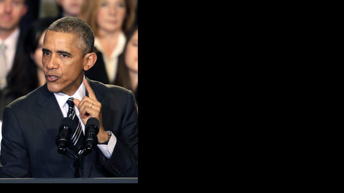 
President Barack Obama addresses the crowd on issues surrounding the protests in Ferguson, Mo., after meeting with community leaders about the executive actions he is taking to fix the immigration system Tuesday, Nov. 25, 2014, in Chicago. 
