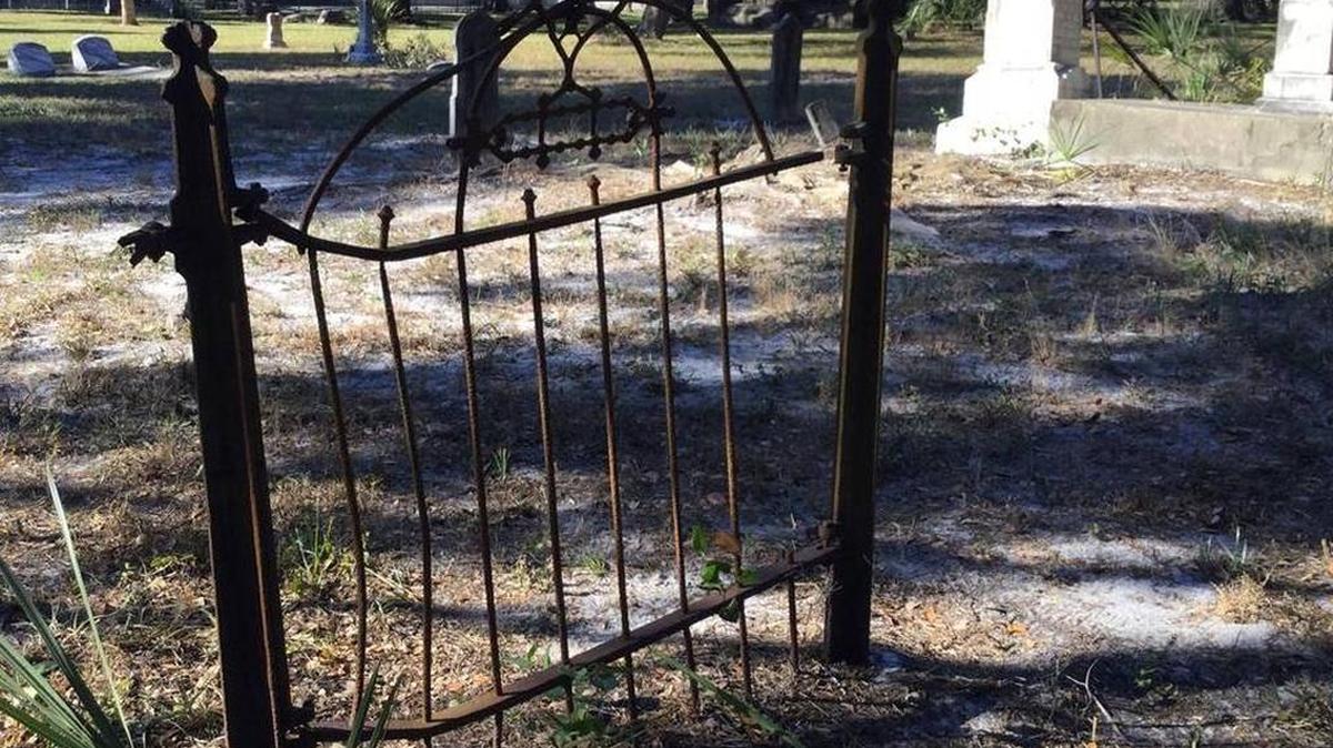 What’s believed to be the original Yellow Fever Cemetery gate stands alone like the tombstones that surround it in Palmetto’s original cemetery named for those victims lost to the 1888 Yellow Fever epidemic.