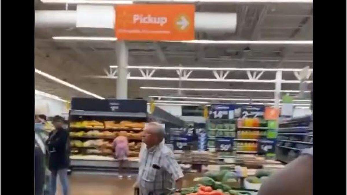 Watch a Walmart greeter and a man without a mask rumble in the aisle