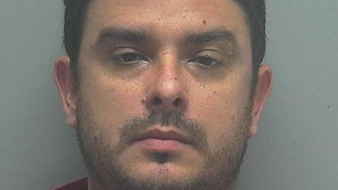 Julio Hernandez, accused of stealing $121,000 worth of Amazon.com orders.