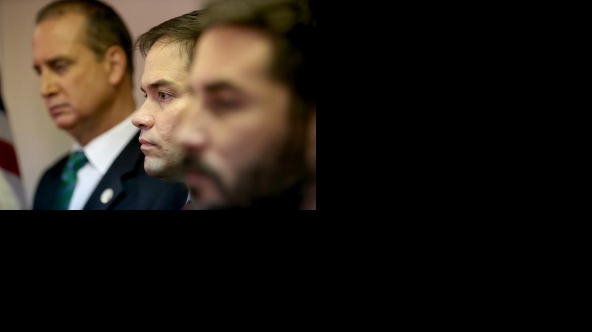 
Sen. Marco Rubio, R-Fla., waits to speak to the media as he is joined by other congressional people as they address the decision by President Barack Obama to change the United States Cuba policy last Thursdayin Miami. Rubio was joined by Rep. Ileana Ros-Lehtinen, R-Miami, and Rep Mario Diaz-Balart, R-Miama, as they held the press conference to denounce the changes to U.S.-Cuba policy by the Obama administration.
