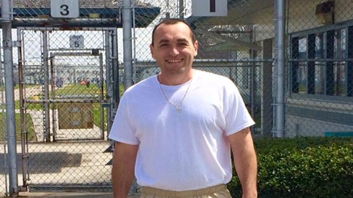 Carlos Manuel Delgado, 37, stands outside Columbia Correctional Institution in Lake City, Fla., after his release Wednesday on a commuted sentence.