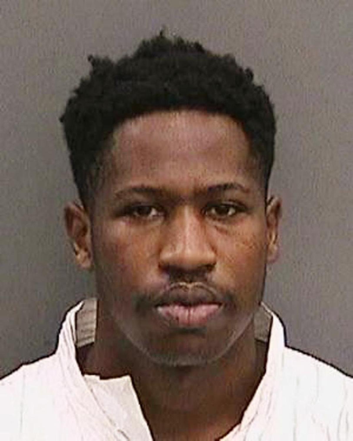 This file booking photo provided by the Tampa Police Department on Wednesday, Nov. 29, 2017, shows Howell Emanuel Donaldson III.