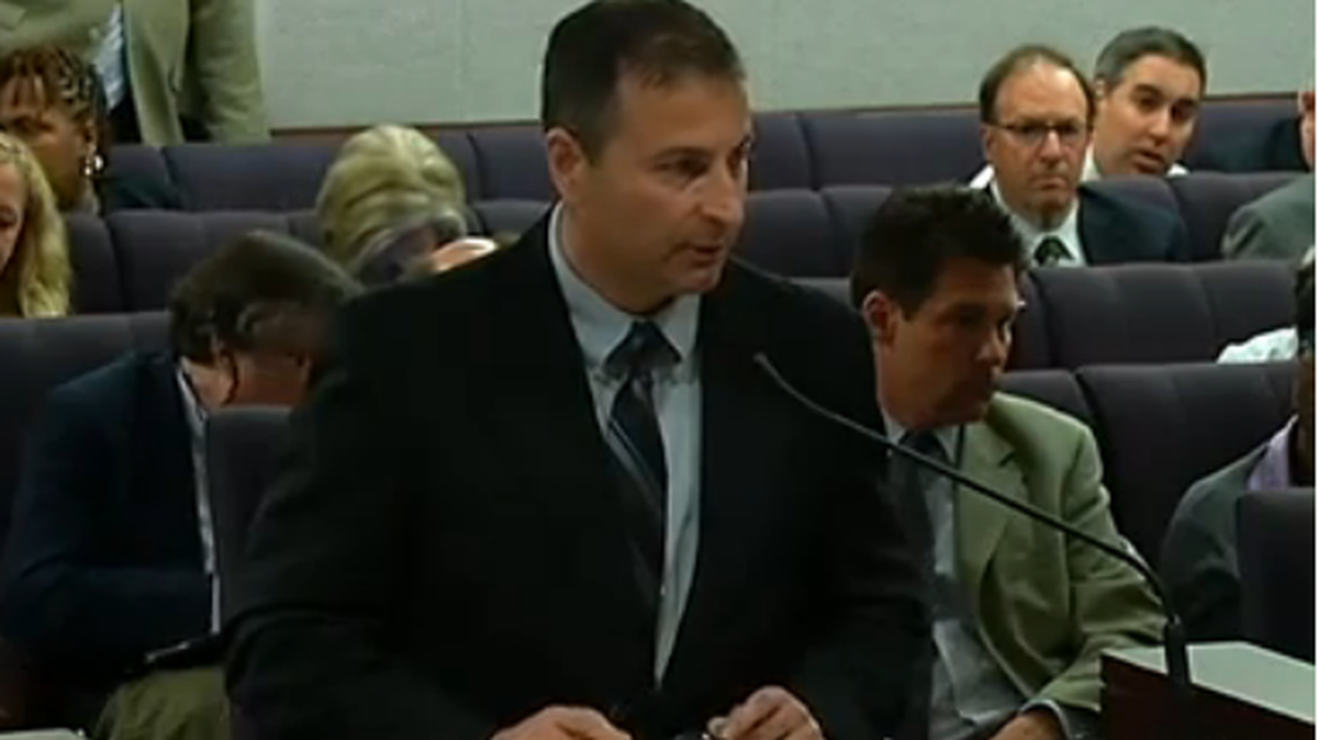 Department of Corrections inspector Doug Glisson speaks before a state Senate committee on allegations of abuse and cover-up