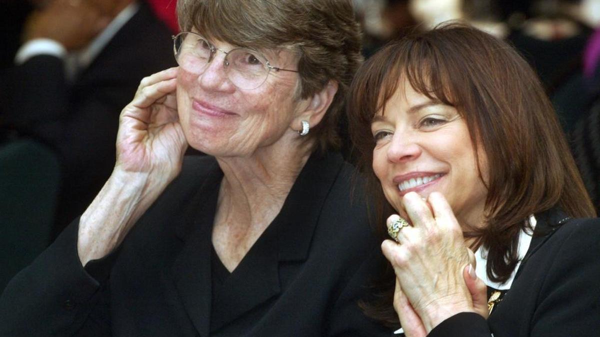 Janet Reno and current Miami-Dade State Attorney Katherine Fernandez Rundle share a light moment at the start of the ceremony commemorating 50 years of the state attorney's office.