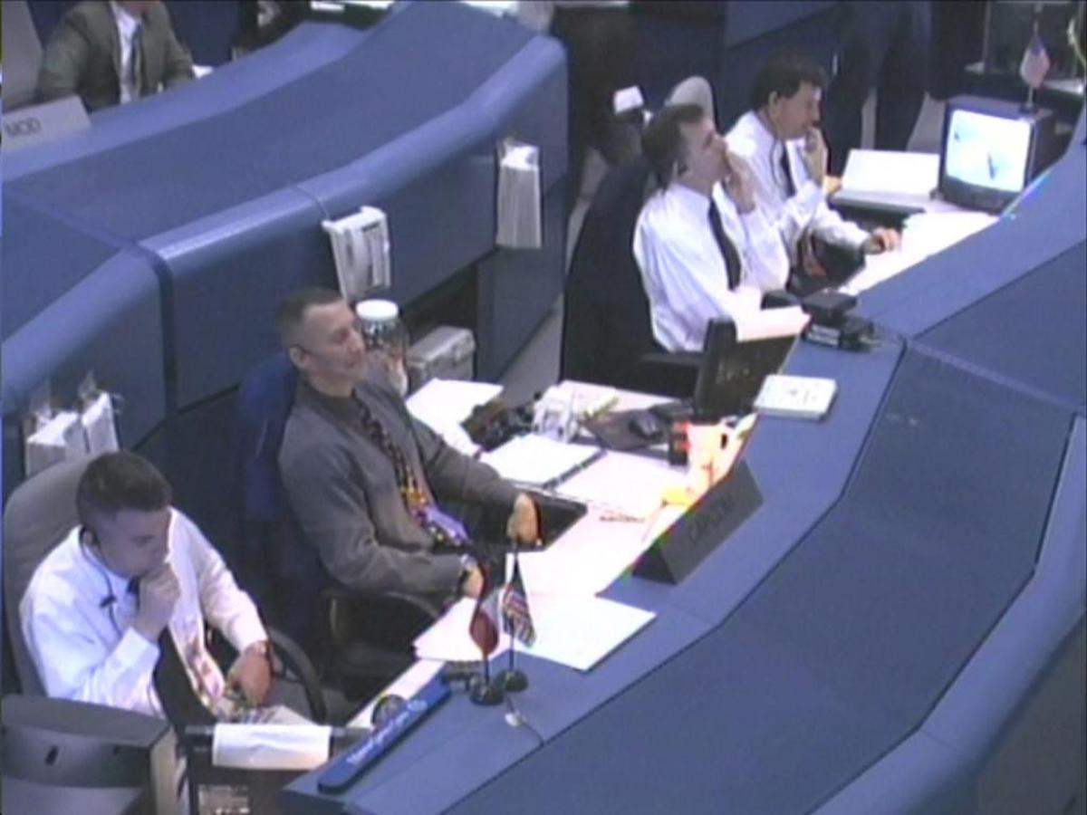 In this image from television on Feb. 1, 2003, NASA mission control in Houston, Texas, wait to hear from the space shuttle Columbia. Space shuttle Columbia disintegrated in flames over Texas minutes before it was to land in Florida. TV video showed what appeared to be falling debris, as NASA declared an emergency and warned residents to beware of falling objects.