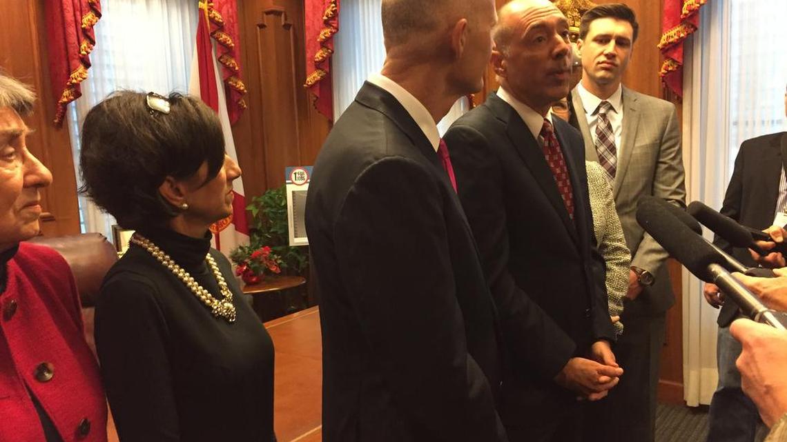 Gov. Rick Scott appointed C. Alan Lawson to be Florida’s next justice of the Supreme Court on Friday, Dec. 16. From left, Lawson’s mother Velma Lawson, sister Laurie Cox, Gov. Scott, Alan Lawson, son Caleb Lawson.