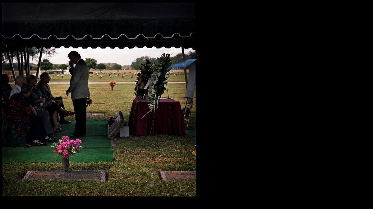 
Glen Varnadoe, the nephew of Thomas Varnadoe, is overcome with emotion at Thomas Varnadoe's burial in Plant City on November 24, 2014. Thomas Varnadoe died at the Florida School for Boys in 1934 and his family fought for decades to have them returned so that he could be buried properly. His remains were identified by a team of researchers from USF who exhumed a cemetery at the school in the Florida Panhandle.
