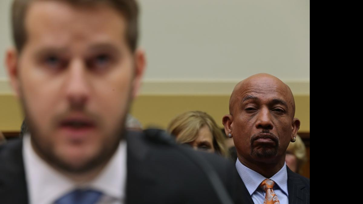 
Television personality Montel Williams listens to Daniel Levinson, son of Robert Levinson, testifiy before the House Foreign Affairs Committee in the Rayburn House Office Building on Capitol Hill June 2, 2015 in Washington, DC. Imprisoned in Iran since 2007, Robert Levinson is a former FBI agent and CIA spy who is the longest-held hostage in American history. The committee heard from relatives of five U.S. citizens currently held in prison in Iran. 
