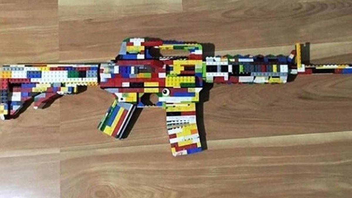 This photo provided by the San Diego County Sheriff's Office shows an AR-15 rifle made of Legos that authorities say a 14-year-old boy posted on Instagram, along with a threat against West Hills High School in Santee, California. The boy, a freshman at the school, was arrested on Feb. 27, 2018, on suspicion of making terrorist threats.