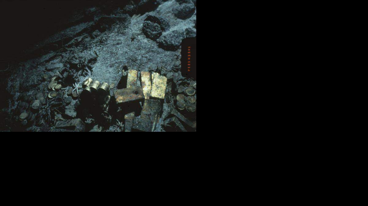 
This 1989 file photo shows gold bars and coins from the S.S. Central America, a mail steamship, which sunk in a hurricane in 1857, about 160 miles off the North Carolina coast. Columbus-America Discovery Group, owned by fugitive treasure hunter Tommy Thompson, argues that it has the exclusive rights to the treasure from the shipwreck.
