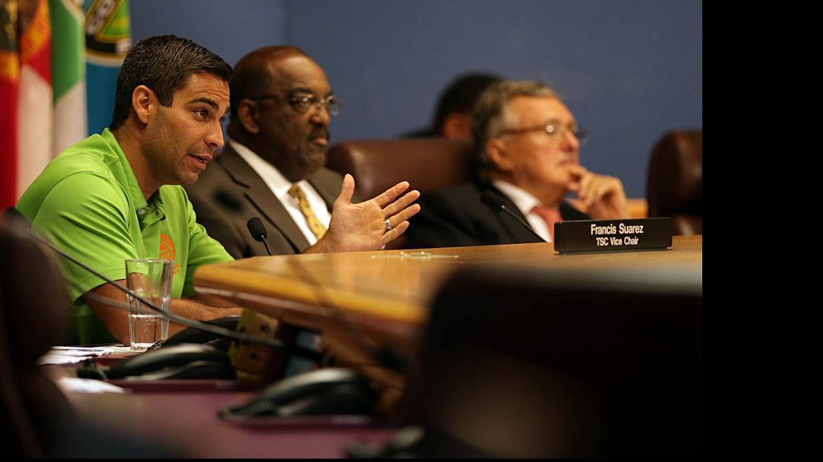 
Commissioner Francis Suarez Miami (left), Miami-Dade Commissioner Dennis C. Moss and Maurice Ferré, a member of the Miami-Dade Expressway Authority (MDX), requested transit statistics during a meeting of a special committee of the Metropolitan Planning Organization (MPO), which approves transportation projects in the county.
