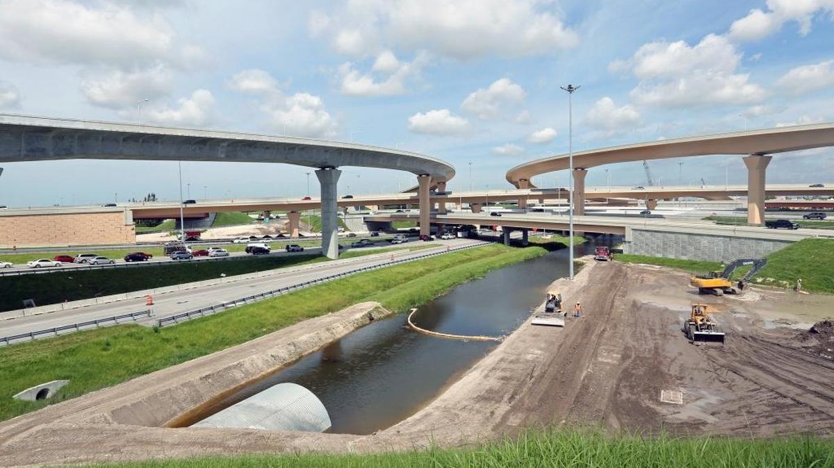
Two soaring flyovers, part of the renovation of the interchange connecting state roads 826 and 836 near Miami International Airport, are expected to Sunday, Oct. 11, 2015.
