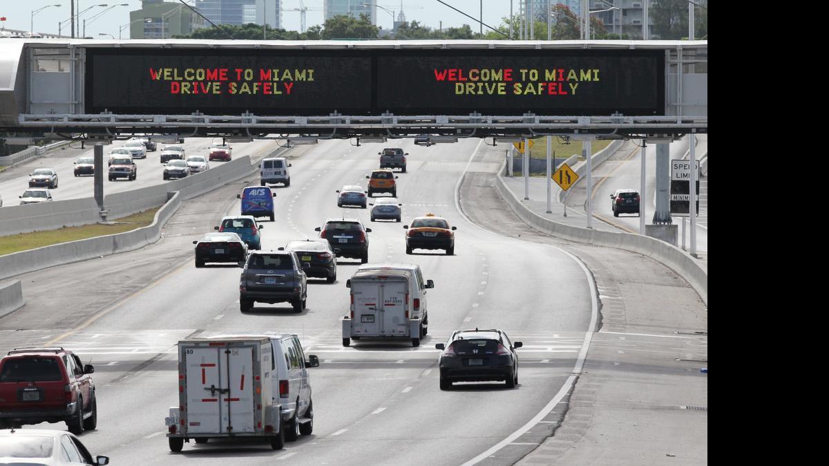
An electronic sign welcomes Miami drivers traveling eastbound on the toll highway 836, near the downtown, on June 3, 2015.
