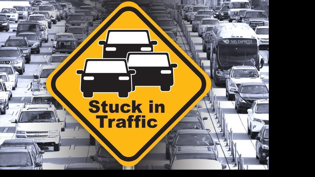 
Vehicles come to a standstill on I-95 northbound between the Northwest 135rd Street and 151st Street exits during rush hour.
