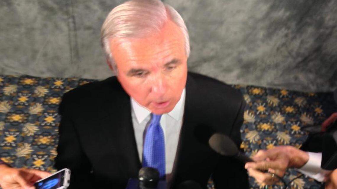 
Miami-Dade Mayor Carlos Gimenez addresses reporters in February 2014. 
