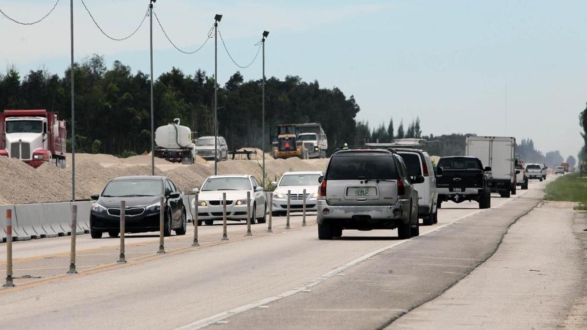 
Workers are widening Krome Avenue from Southwest 272nd Street to Okeechobee Road. The project will include four 12-foot travel lanes (two in each direction), separated by a 40-foot grass median and guardrail.
