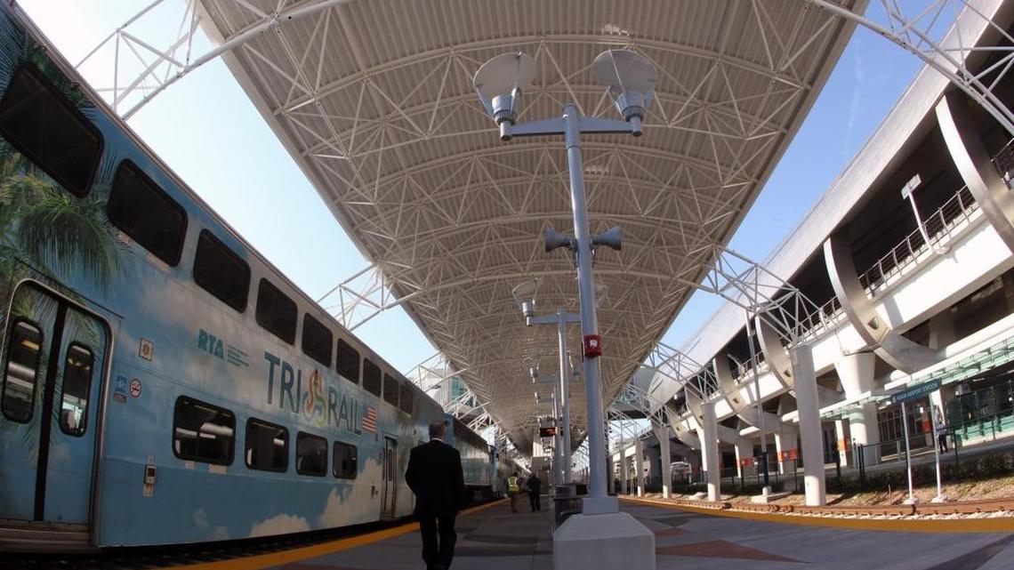 A Tri-rail train pulls into the station at the Miami Intermodal Center. The new Amtrak station was built was a platform too short for some of those trains.
