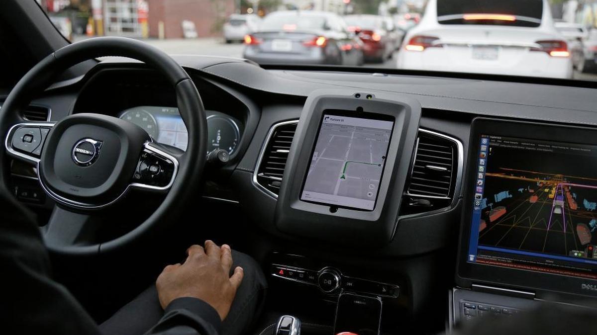 In this Tuesday, Dec. 13, 2016, file photo, an Uber driverless car waits in traffic during a test drive in San Francisco.