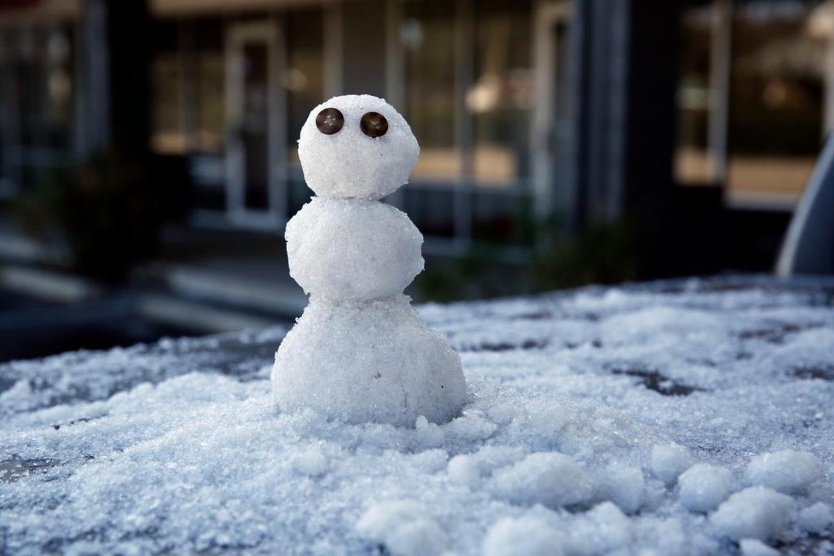 A snowman sits on the back of a truck on Jan. 3, 2018, in Tallahassee. Another big freeze is expected Jan. 17-18 in the region.