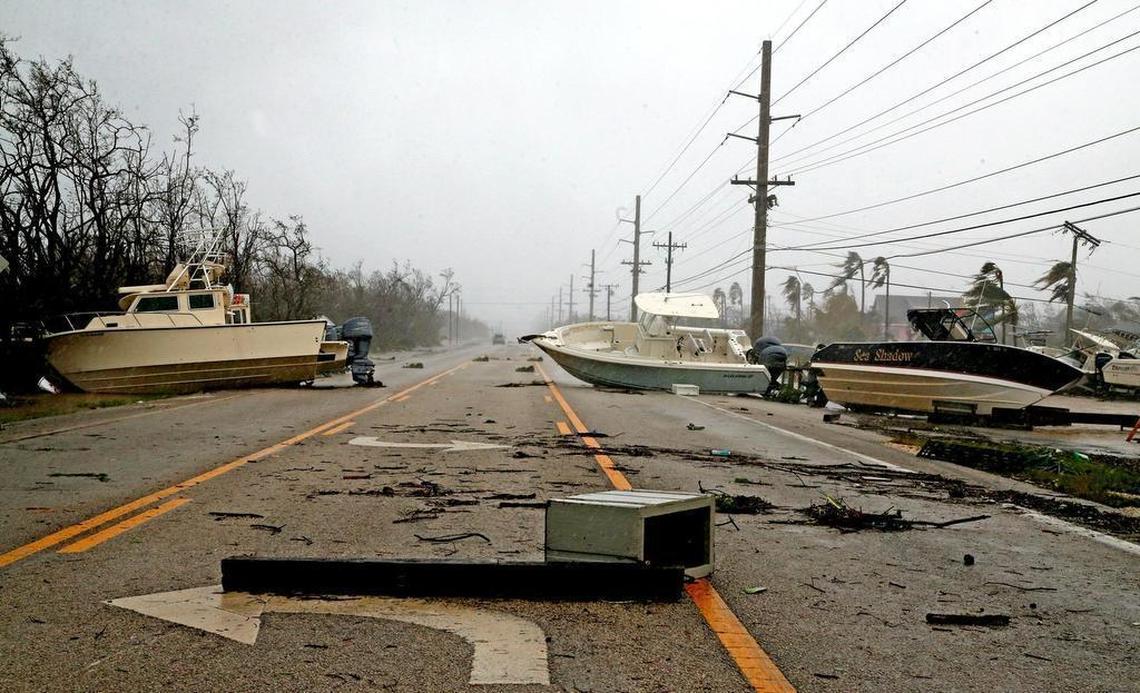 Boats block the Overseas Highway after Hurricane Irma surge tossed debris, boats, cars, sheds, and appliances onto the highway throughout the middle Keys, September 10, 2017.