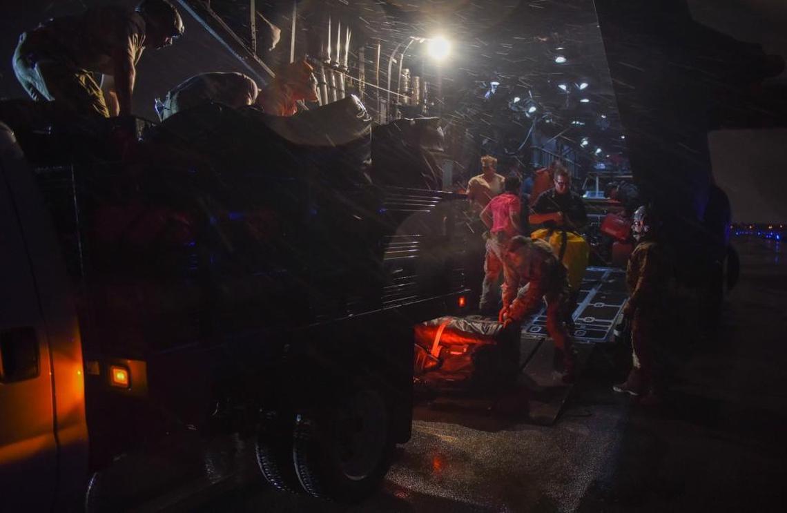 U.S. Coast Guard and Air Force personnel remove supplies and gear from an Air Force HC-130 aircraft at Coast Guard Air Station Miami in Opalocka, Fla., Sept. 9, 2017. Air Force Pararescuemen from the 212th Rescue Squadron prepare to respond alongside federal, state and local first responders in the rescue efforts for people in distress as Hurricane Irma passes through south Florida.