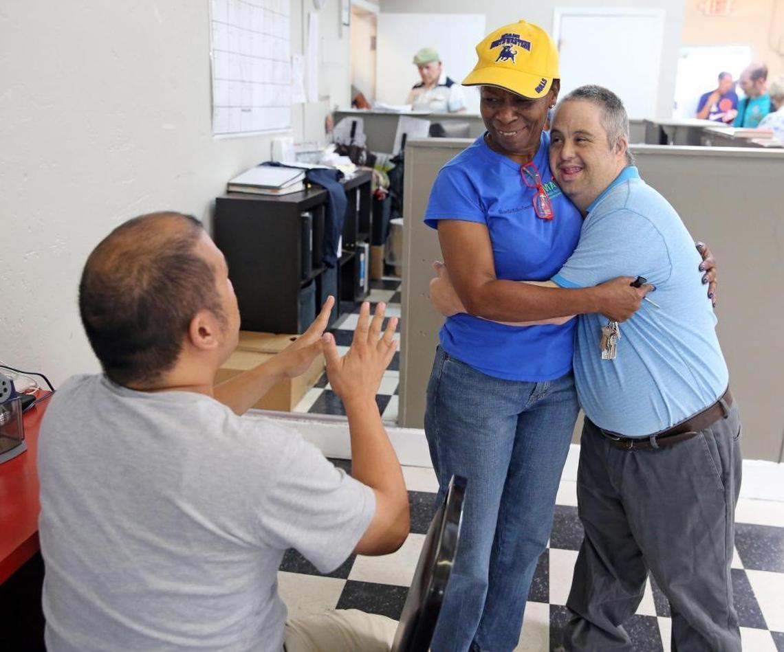 The elderly and those with special needs are some of the most vulnerable in the community. At Mac Town (the Miami Achievement Center for the Developmentally Disabled) resident Robert DeLeon gives a big hug to office administrator Sharella Everett. The center has opened its doors to some of their other facilities that needed to be evacuated due to Irma.