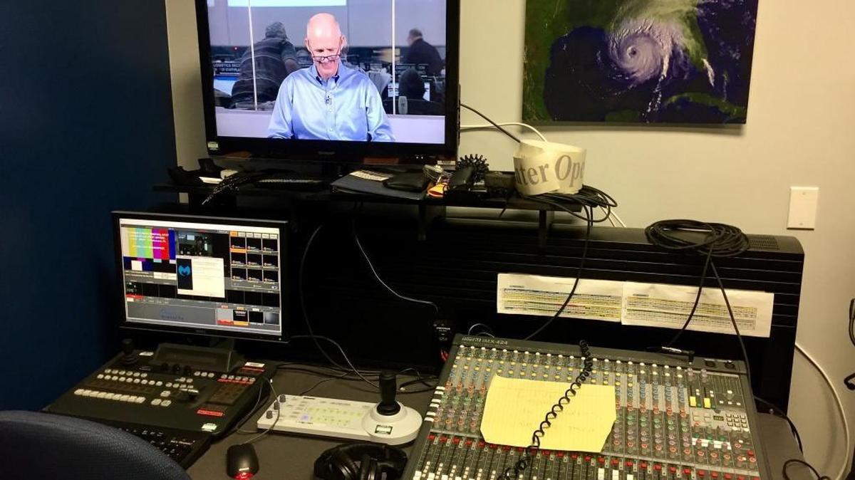 From the state Emergency Operations Center in Tallahassee, Florida Gov. Rick Scott reviews his talking points before a four-hour stretch of TV interviews on national morning shows on Sunday, Sept. 10, 2017.