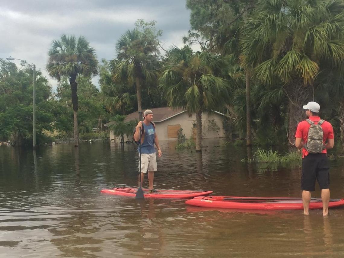 Residents in Bonita Springs were getting around on paddleboards three days after Hurricane Irma ravaged the Southwest coast of Florida.