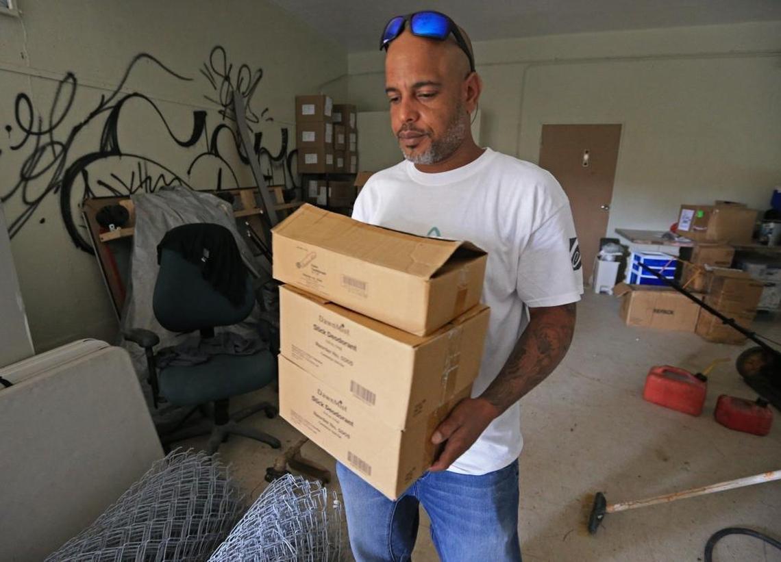 Mountain Point outreach counselor Carlos Sanchez carries supplies from a storage area in Cidra, Puerto Rico on Thursday, Oct. 19, 2017.