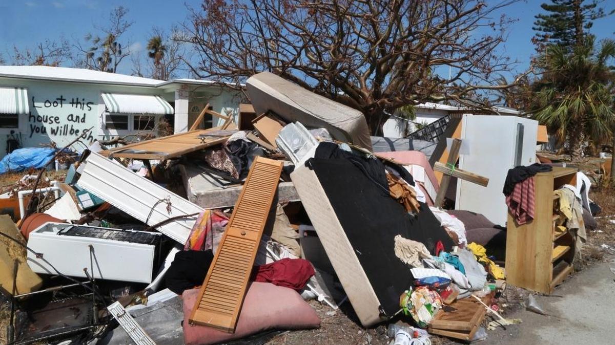 View of a wrecked home and belongings scattered by Hurricane Irma in Marathon Key on Saturday, Sept. 16, 2017.