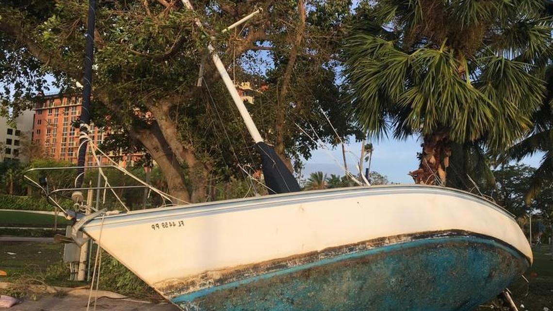 A sailboat washed ashore by Hurricane Irma in Coconut Grove. The Mutiny hotel can be seen in the background.
