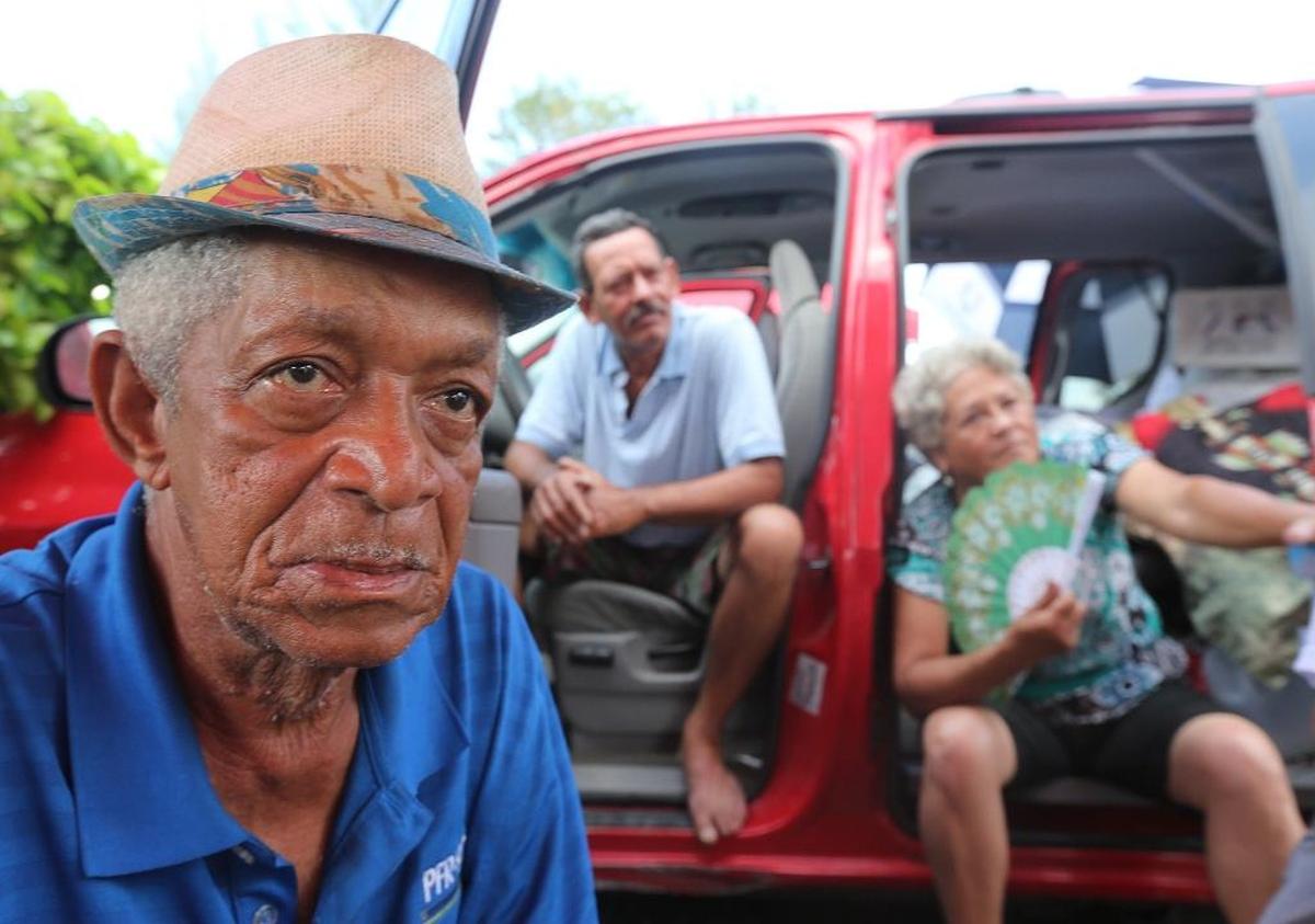 Danilo Sánchez, 76, Carlos Safon and Onelia Corona are among at least 80 residents of the Civic Towers who have spent nine days sleeping outside the twin buildings in Allapattah for Section 8 subsidized housing.