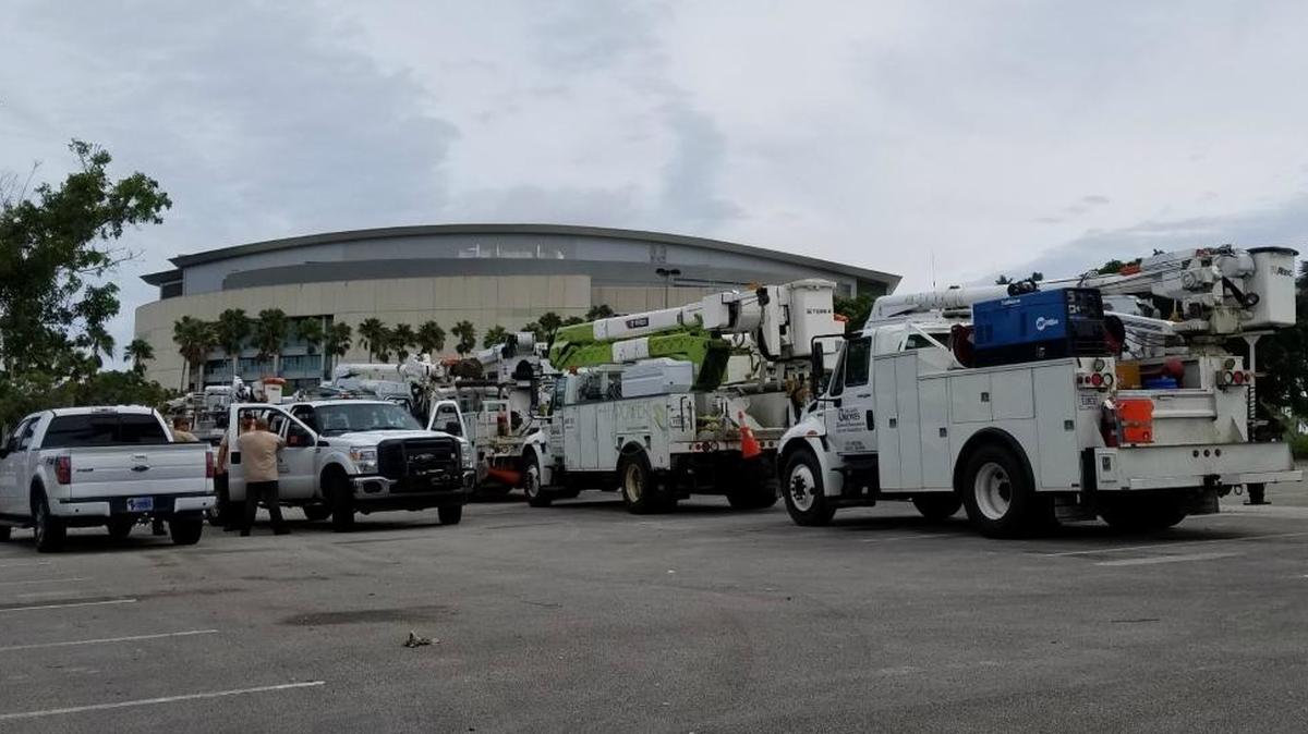 Power crews line up at BB&T Center in Sunrise to began heading north following Hurricane Matthew on Oct. 7, 2016.