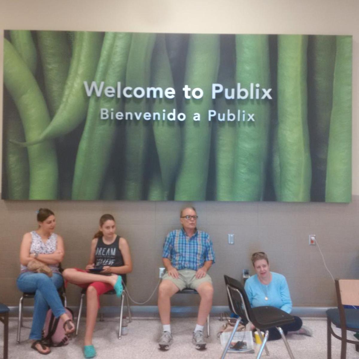 South Floridians without power have made the Publix on Red Road near Southwest 16th Street their home since the store opened on Tuesday afternoon after Hurricane Irma. Neighborhood residents are using the store’s electrical outlets to charge their phones on Wednesday, Sept. 13, 2017. They had been sitting on the floor, until store manager Freddy Cazanove brought over some chairs from the store’s cafe. Lourdes Casal, the woman sitting on the floor, said she preferred the cold floor - it kept her cool.