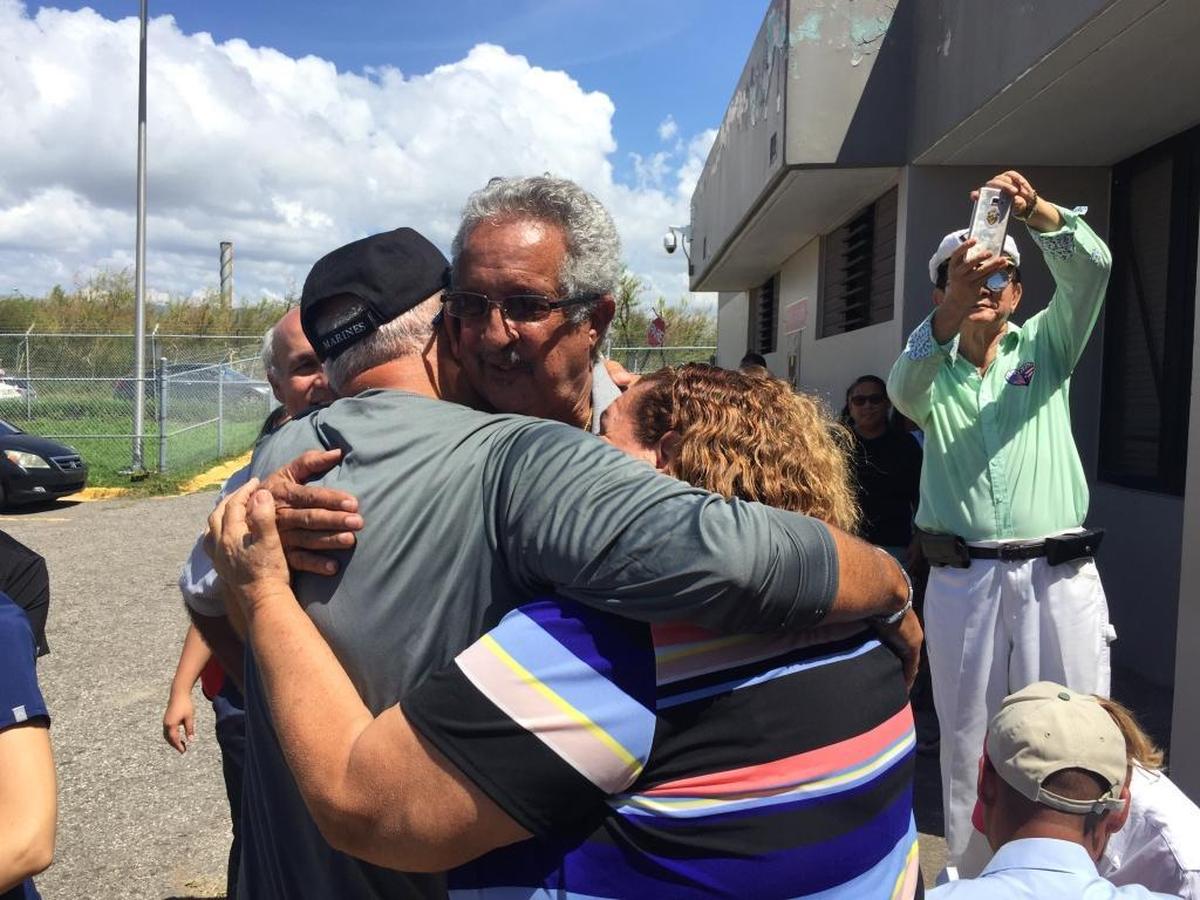 State Sen. Victor Torres, D-Orlando, hugs his uncle in Ponce.