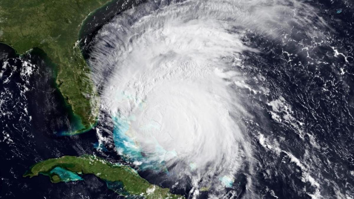 A satellite image shows Hurricane Irene off the coast of Florida moving over the northwestern Bahamas in August 2011 as a Cat 3 storm.