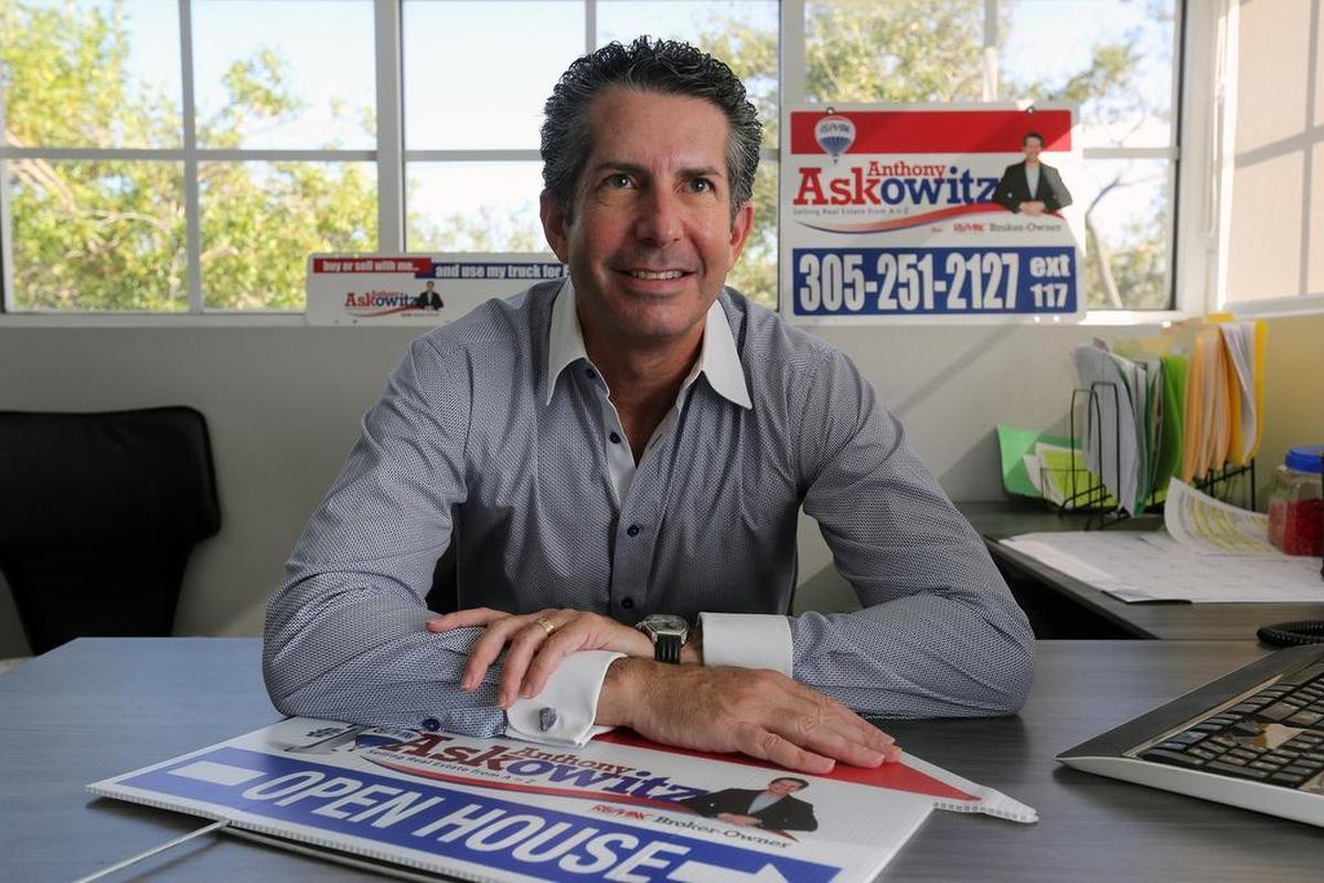 Broker-owner of RE/MAX Advance Realty and RE/MAX Advance Realty II at his office at 11010 Kendall Dr., Suite 200.