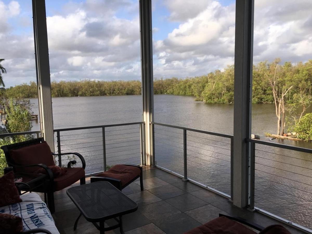 The view from Joe and Liz West’s lanai at their hurricane-resistant stilt home in Everglades City. They watched from here as Irma rolled in, but later moved behind their hurricane-resistant windows to watch the full fury