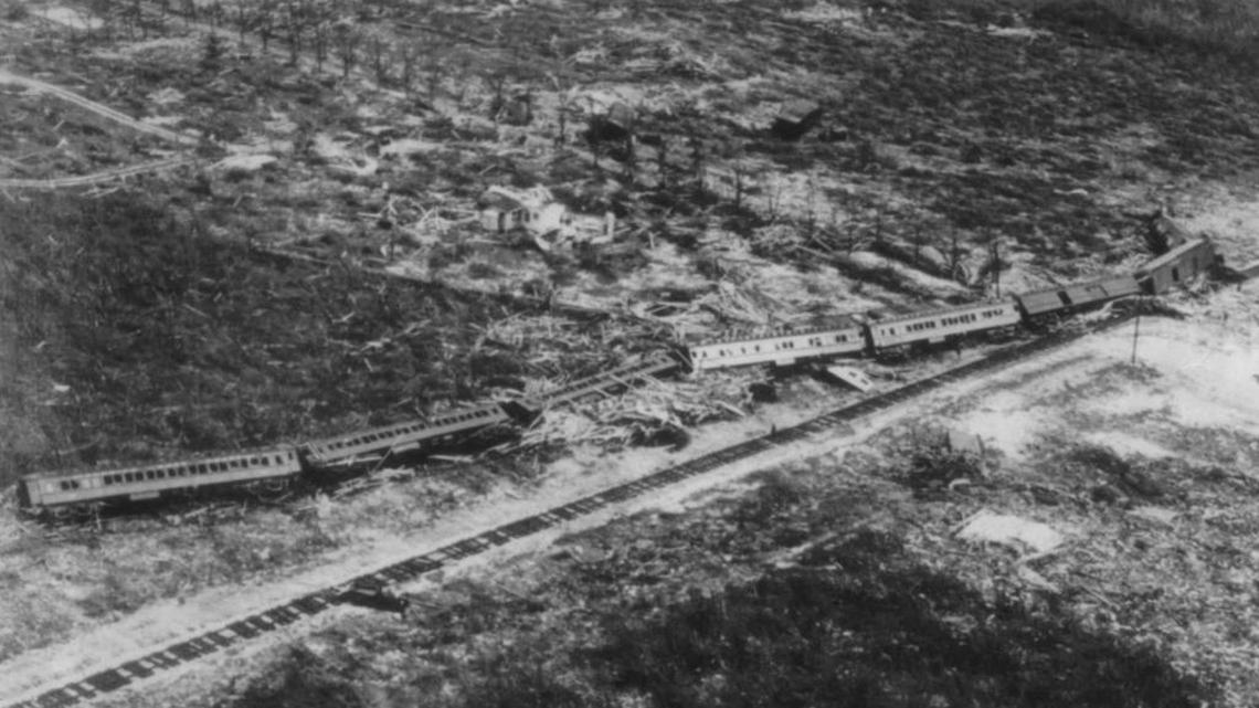 A 1935 aerial photo of an eleven-car Overseas Railroad train swept off the tracks near Islamorada during the Labor Day Hurricane of 1935.