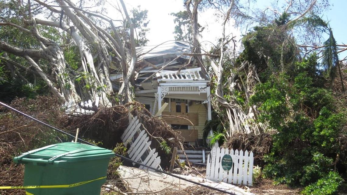 This Key West house suffered damage from falling trees.